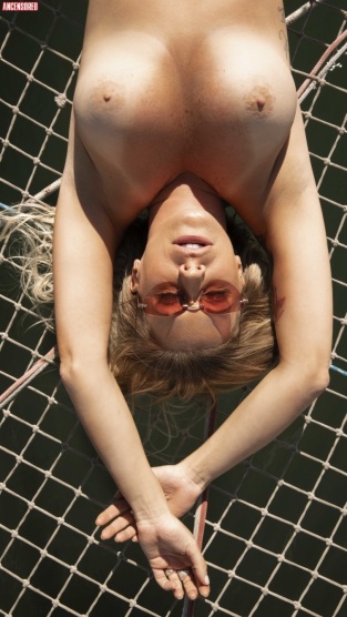 Antonela Avellaneda in a short skirt breasts