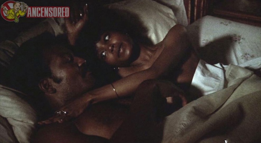 Brenda Sykes in a short skirt breasts