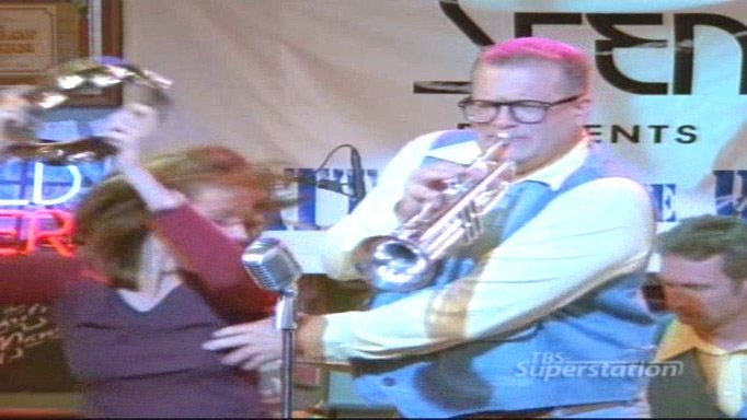 Christa Miller in a short skirt breasts