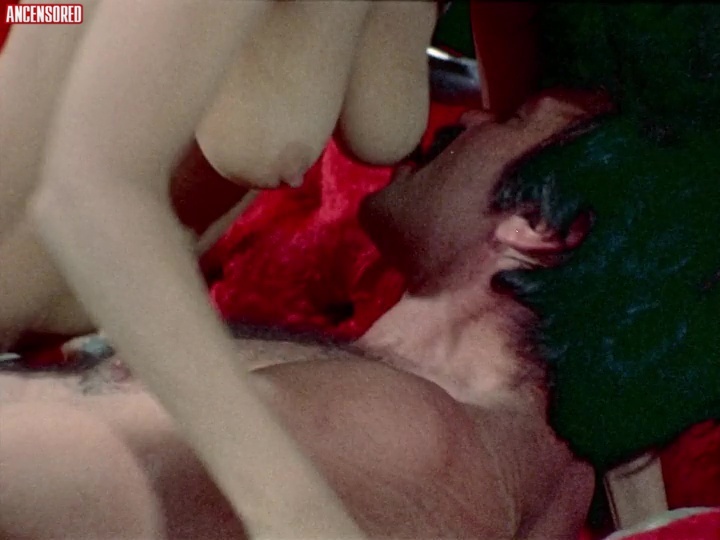 Jan Mitchell in a short skirt breasts