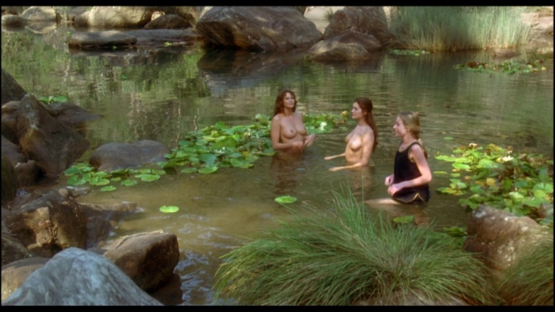 Kate Fischer in a short skirt breasts