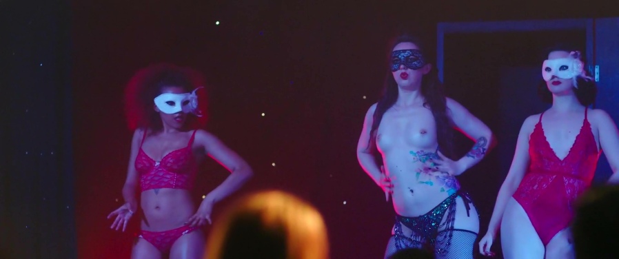 Lady Wild Flower in a short skirt breasts