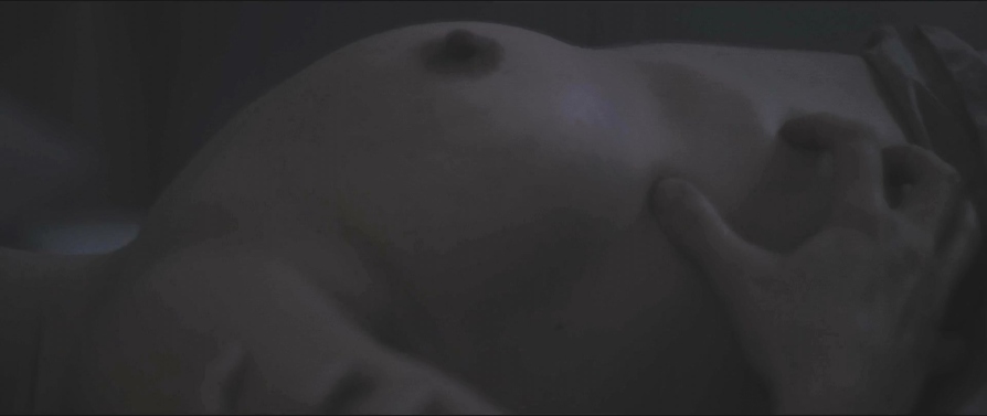 Lanna Ohlsson in a short skirt breasts