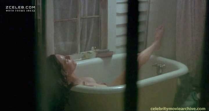 Lisa Blount in a skirt