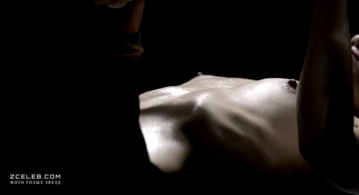 Manuela Martelli in a short skirt breasts