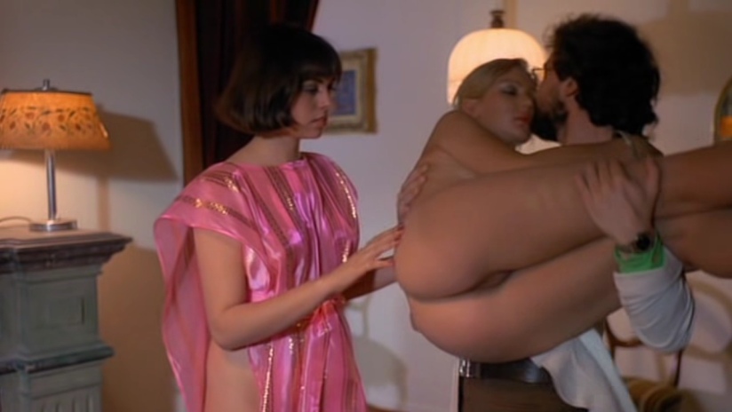 Martine Stedil in a short skirt breasts