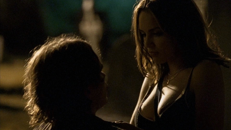 Rachael Leigh Cook in a short skirt breasts