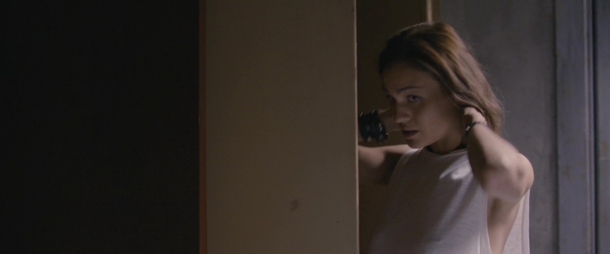 Sophie Skelton in a skirt