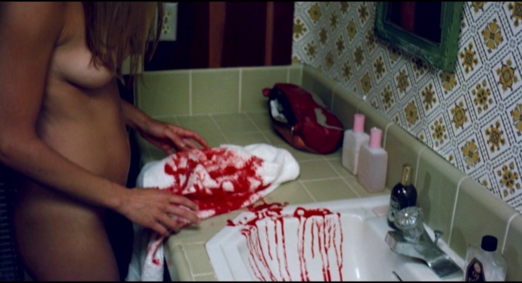 Suzanna Love in a skirt